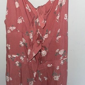 Hollister Peach & floral jumpsuit, with cutouts adjustable straps, size medium